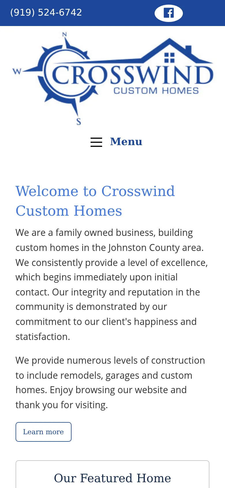 The old site on a phone: the blue logo, a Menu button and a Welcome to Crosswind Custom Homes paragraph, with no photo.
